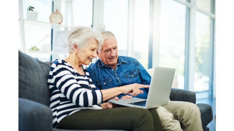 Retired couple surfing the internet