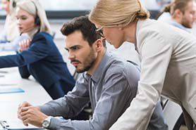 People working on office computer